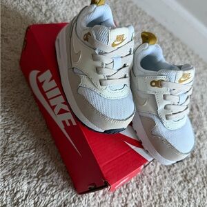 Nike Kids Cream and Gold Sneakers